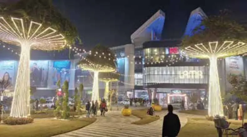 Packages Mall external development at night